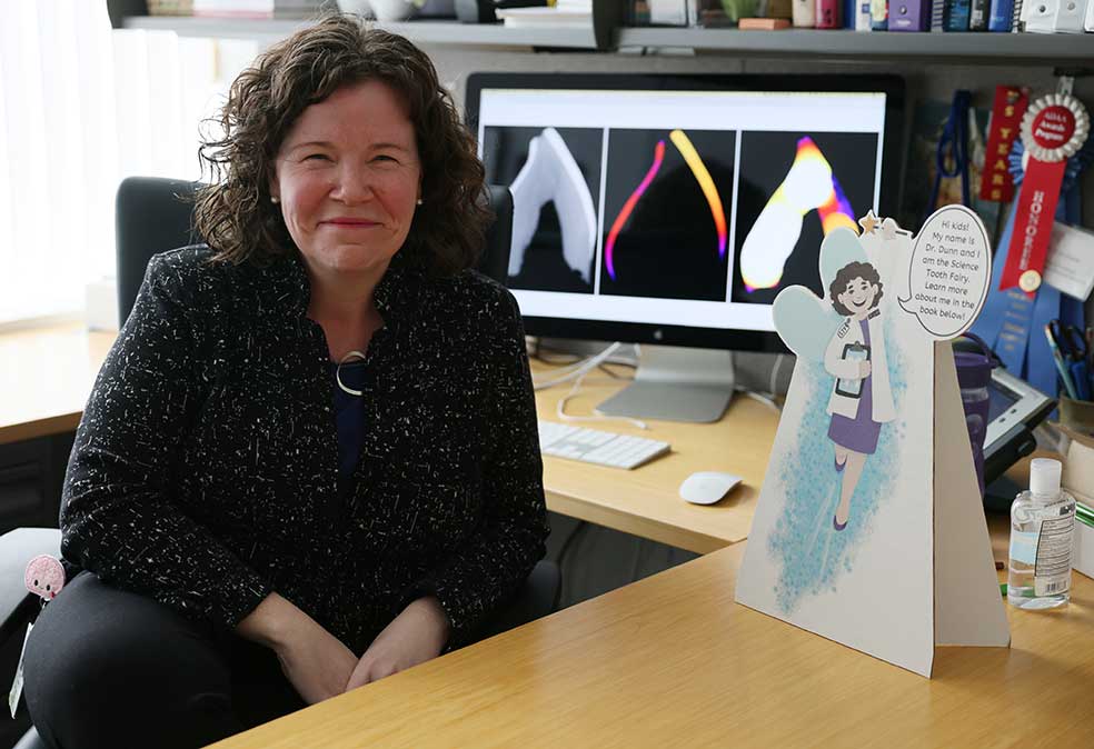 La epidemióloga Erin Dunn estudia si los dientes de leche funcionan como un 'archivo' de nuestra infancia.