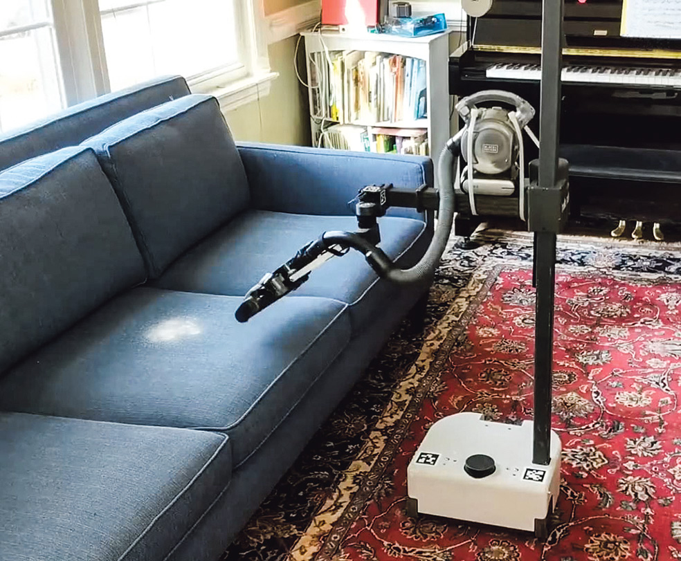 El robot Stretch, minimalista y ligero, escanea el espacio para detectar objetos o elementos que identifica como susceptibles de ser ordenados o limpiados. Y cuenta con dispositivos que le permiten aspirar superficies.